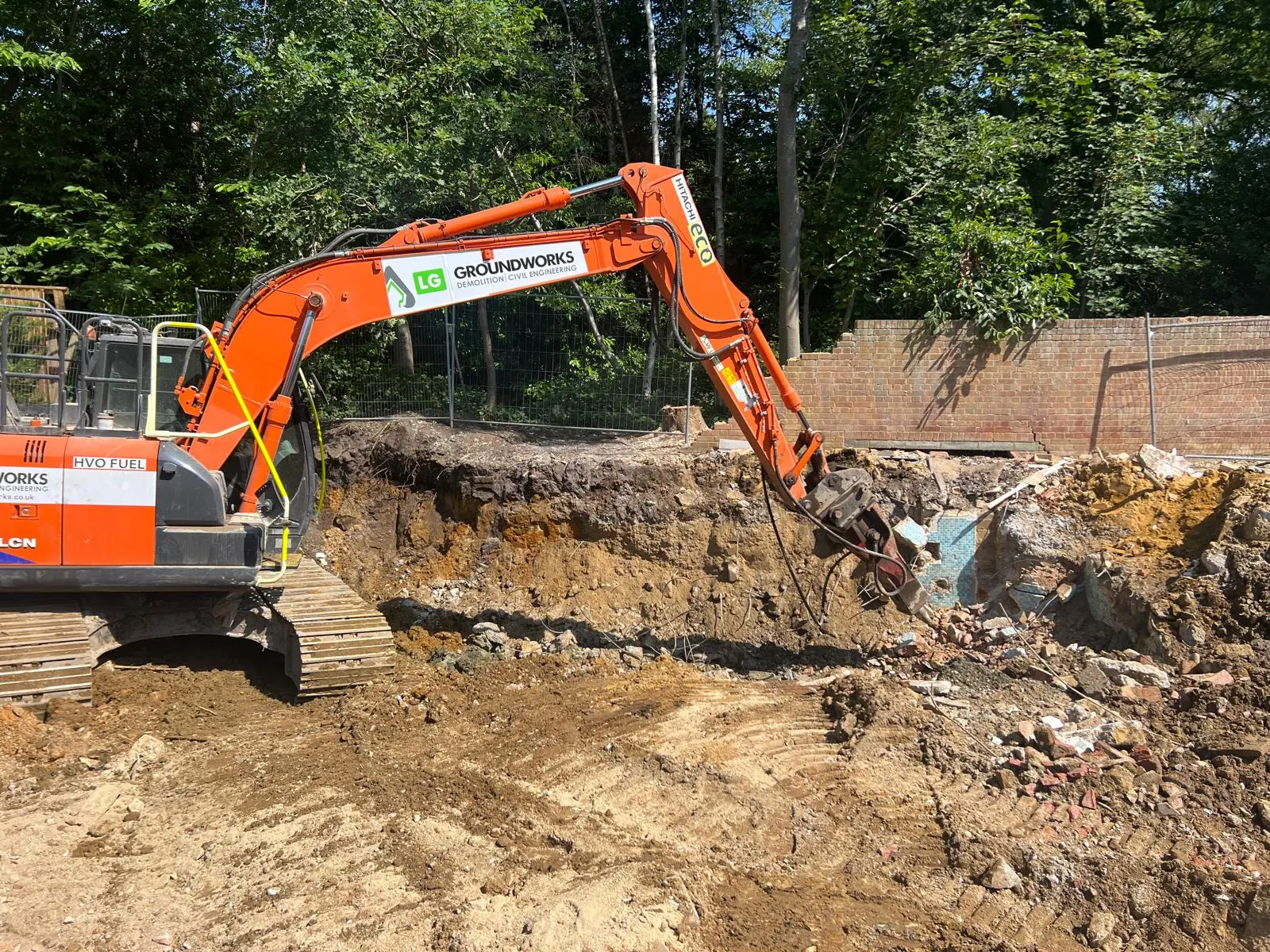 LG Groundworks excavator carrying out site excavation